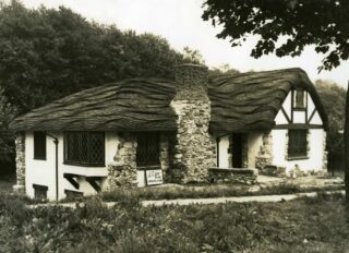 On this archival photograph of the famed "hobbit house" we see a different angle centered on the chimney.