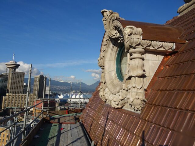 Skyline of Vancouver and details of Sun Tower building.